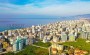 kvartiry-1-1-i-2-1-v-stroyashemsya-komplekse-vsego-v-400-m-ot-morya-v-makhmutlare-56-m2 в Турции - фото 2
