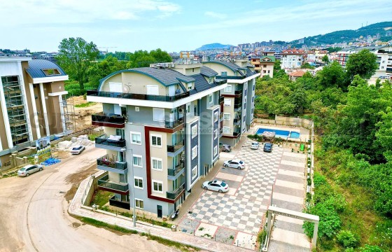 Уютная квартира 2+1 в престижном районе Оба в Турции - фото 11