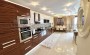 kvartira-planirovkoi-2-1-obshei-ploshadyu-125m2-s-pryamym-vidom-na-sredizemnoe-more-v-raione-makhmutlar в Турции - фото 2