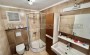kvartira-planirovkoi-2-1-obshei-ploshadyu-125m2-s-pryamym-vidom-na-sredizemnoe-more-v-raione-makhmutlar в Турции - фото 2