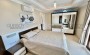 kvartira-planirovkoi-2-1-obshei-ploshadyu-125m2-s-pryamym-vidom-na-sredizemnoe-more-v-raione-makhmutlar в Турции - фото 2
