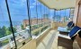 kvartira-planirovkoi-2-1-obshei-ploshadyu-125m2-s-pryamym-vidom-na-sredizemnoe-more-v-raione-makhmutlar в Турции - фото 2