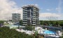 kvartira-1-1-v-elitnom-stroyashemsya-komplekse-v-demirtashe-55-m2 в Турции - фото 2