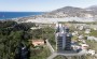 kvartira-1-1-v-elitnom-stroyashemsya-komplekse-v-demirtashe-55-m2 в Турции - фото 2
