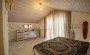 villa-4-1-s-privatnym-uchastkom-v-prestizhnom-raione-tepe-220-kv-m в Турции - фото 2