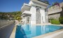 villa-4-1-s-privatnym-uchastkom-v-prestizhnom-raione-tepe-220-kv-m в Турции - фото 2
