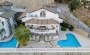 villa-4-1-s-privatnym-uchastkom-v-prestizhnom-raione-tepe-220-kv-m в Турции - фото 2