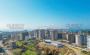 svetlye-apartamenty-11-s-vidom-na-more-v-novom-komplekse-v-raione-avsallar-54-m2 в Турции - фото 2