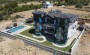elitnaya-trekhetazhnaya-villa-8-3-obshei-ploshadyu-660-m2-v-spokoinom-prestizhnom-raione-alani-inzhekum в Турции - фото 2