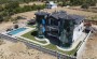 elitnaya-trekhetazhnaya-villa-8-3-obshei-ploshadyu-660-m2-v-spokoinom-prestizhnom-raione-alani-inzhekum в Турции - фото 2
