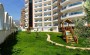 svetlaya-uyutnaya-kvartira-1-1-v-blagoustroennom-zhilom-komplekse-v-centre-raiona-makhmutlar в Турции - фото 2