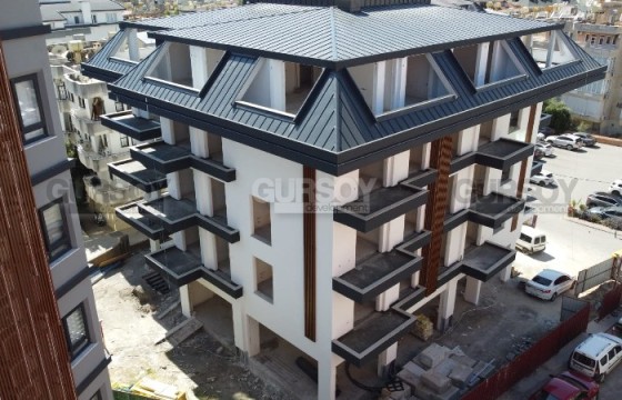 Просторная квартира 1+1, на площади 79 м2, в комфортабельном жилом комплексе на завершающем этапе строительства, в центре Аланьи в Турции - фото 1