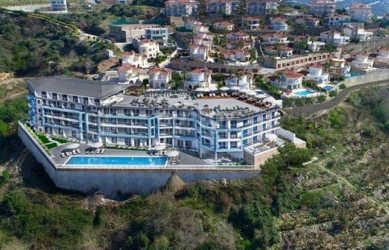 Небольшая квартира с чистовой отделкой в престижном районе Аланьи - Каргыджак в Турции - фото 2