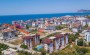 kvartira-2-1-s-sovremennym-dizainom-komfortabelnoi-mebelyu-i-bytovoi-tekhnikoi-v-centre-prestizhnogo-raiona-alani-kestel в Турции - фото 2