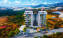 kompleks-otelnogo-tipa-s-kvartirami-50-172-m2-v-demirtase в Турции - фото 2