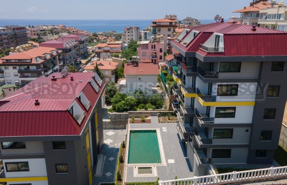 Квартира 1+1 с мебелью в новом жилом комплексе в Кестеле в Турции - фото 6