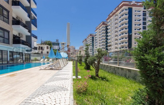 Квартира 1+1 в новом комплексе в Махмутларе в Турции - фото 4