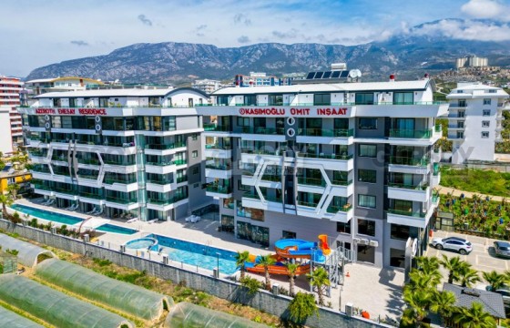 Стильные апартаменты 2+1 в районе Каргыджак в Турции - фото 11