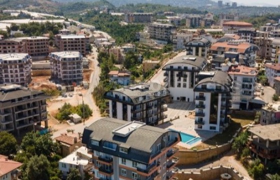Недорогая квартира 1+1 в новом жилом комплексе в районе Оба в Турции - фото 1