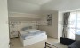 dvukhurovnevye-apartamenty-3-1-v-500-metrakh-ot-morya-v-raione-oba в Турции - фото 2