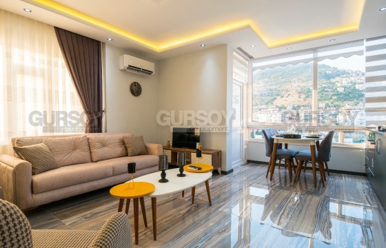Квартира 1+1 в центре Алании с видом на море и горы в Турции - фото 4