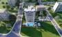 novyi-proekt-v-centralnoi-chasti-goroda-mersin-raione-enishekhir-62-m2 в Турции - фото 2