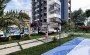 novyi-proekt-v-centralnoi-chasti-goroda-mersin-raione-enishekhir-62-m2 в Турции - фото 2
