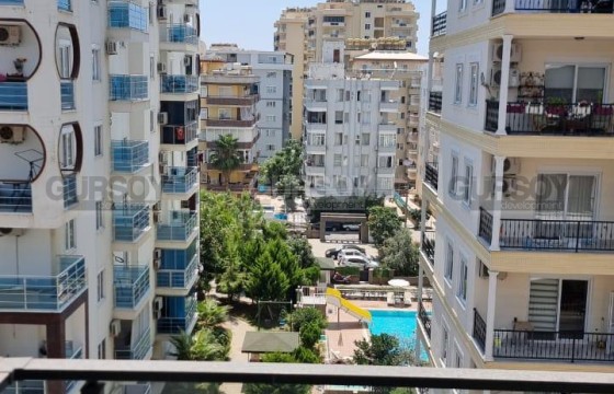 Квартира 1+1 в самом центре Махмутлара в Турции - фото 9