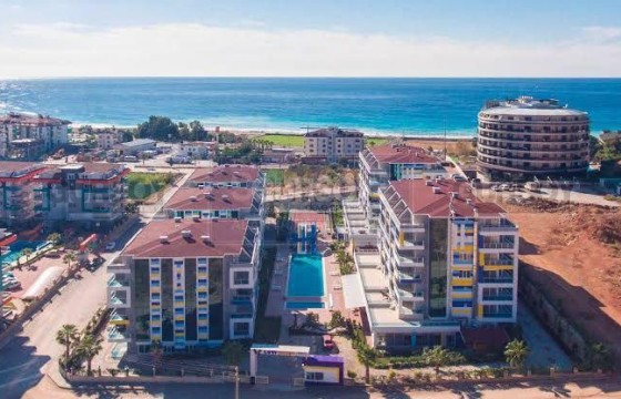 Просторный дуплекс 2+1 с видом на море в популярном комплексе в Турции - фото 11