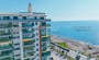 kvartira-1-1-s-panoramnym-vidom-na-more-v-makhmutlare в Турции - фото 2