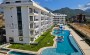sovremennaya-kvartira-1-1-v-raione-oba-alanya-novyi-kompleks-2025-goda-s-kurortnoi-infrastrukturoi в Турции - фото 2