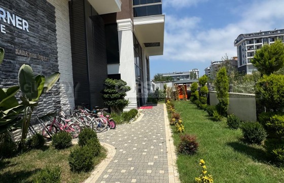 Квартира 1+1 на главной улице Махмутлара — 2 этаж, до моря 400 м в Турции - фото 1
