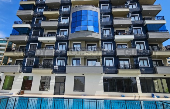 Квартира 1+1 в новом комплексе,  в живописном месте  рядом с морем в Турции - фото 12