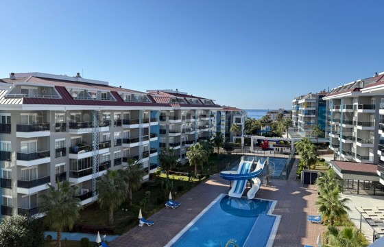 Меблированная квартира 1+1 рядом с морем в кестеле в Турции - фото 12