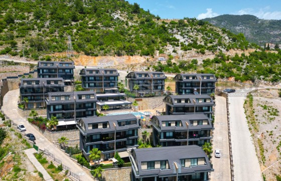 Просторная квартира 4+1 в качественном комплексе в районе Тепе в Турции - фото 10