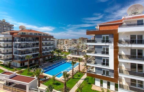 Просторная квартира 2+1 в элитном комплексе рядом с морем в Обе в Турции - фото 6
