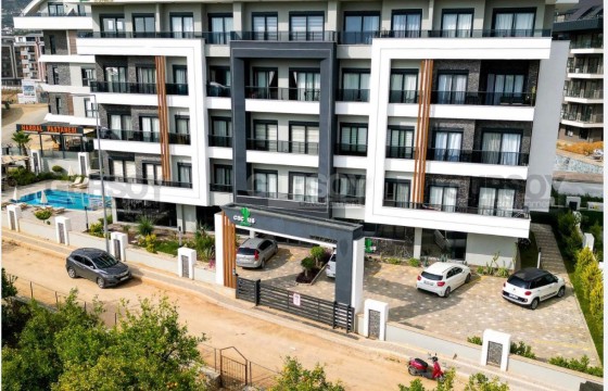 Современная квартира 1+1 в комплексе с хорошей инфраструктурой в Турции - фото 7