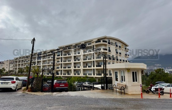 Современная квартира планировка 2+1 в районе ОБА в Турции - фото 8