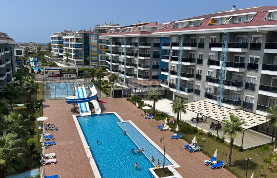 Двухуровневая квартира 2+1 в Кестель, 300 м до моря в Турции - фото 10