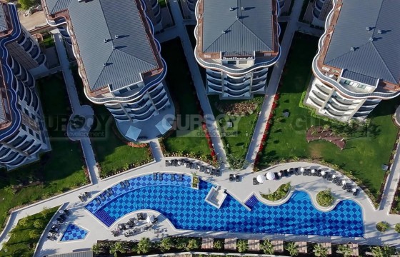 Квартира 2+1 с видом на инфраструктуру в новом премиальном комплексе в престижном районе в Турции - фото 1