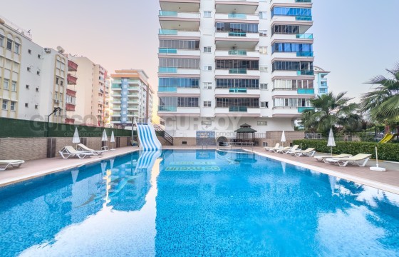 Просторная квартира 1+1 с мебелью всего в 350 м от моря, в самом центре Махмутлара в Турции - фото 9