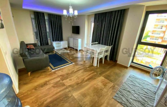 Квартира с мебелью 1+1 в 300 м от пляжа, в начале районе Махмутлар в Турции - фото 6