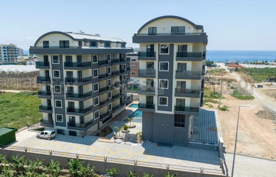 Уютная квартира 1+1 с мебелью и техникой в 300 м от моря, Каргыджак в Турции - фото 3