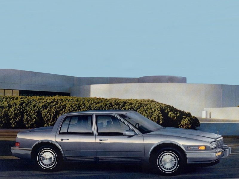 Сбоку