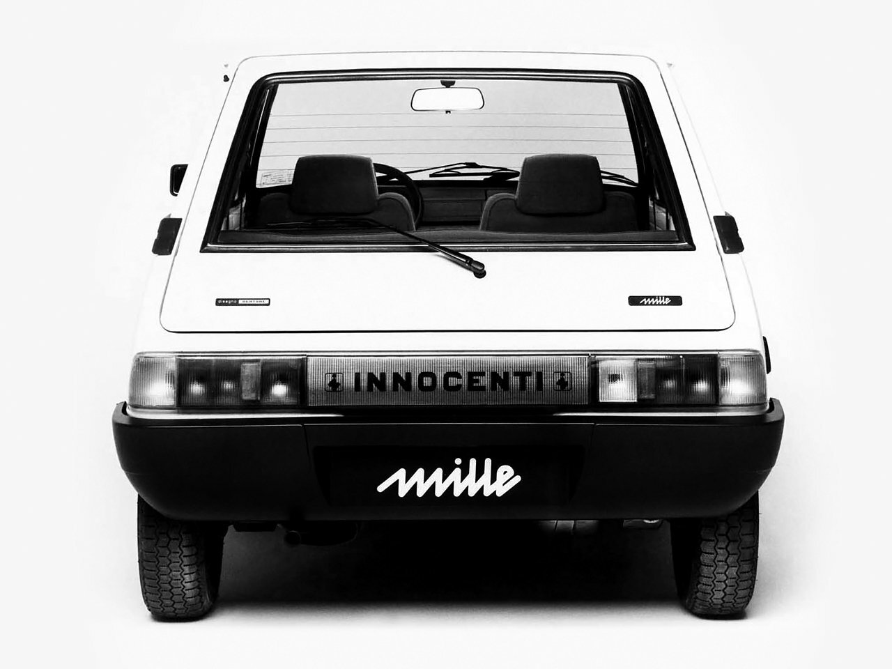 Сзади
