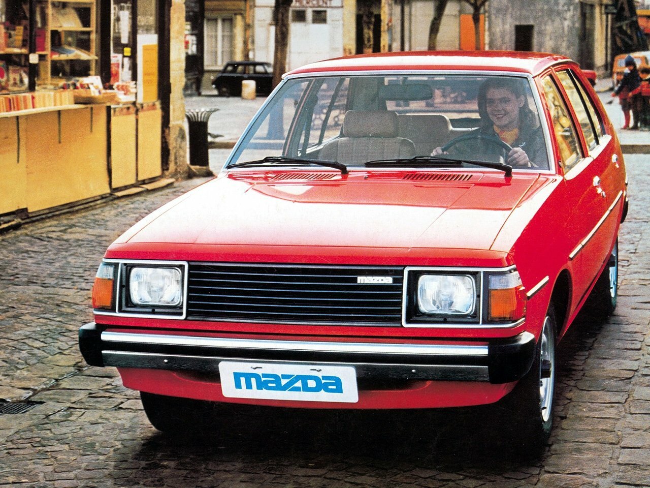 Спереди
