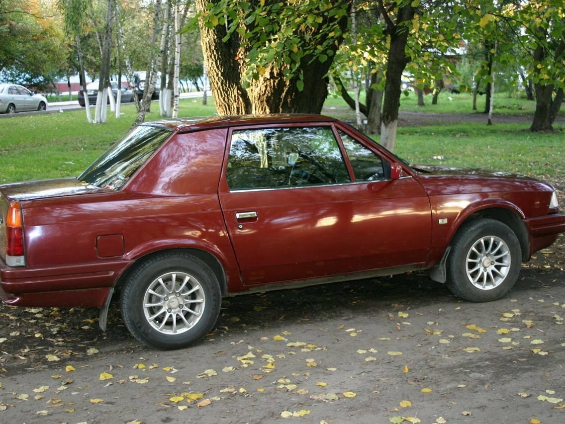 Сбоку