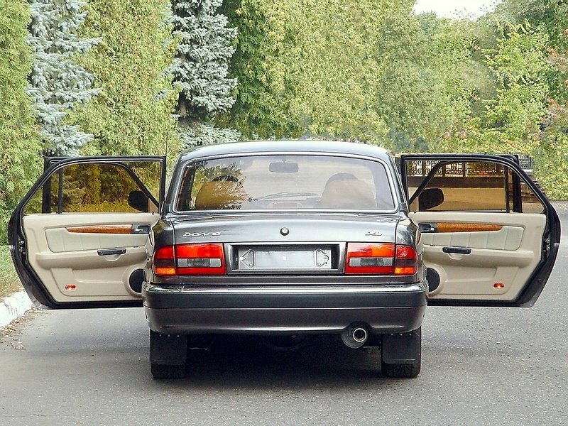 Сзади