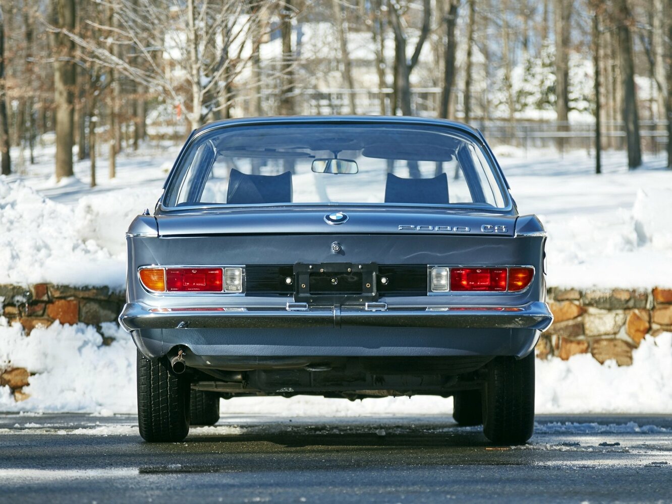 Сзади