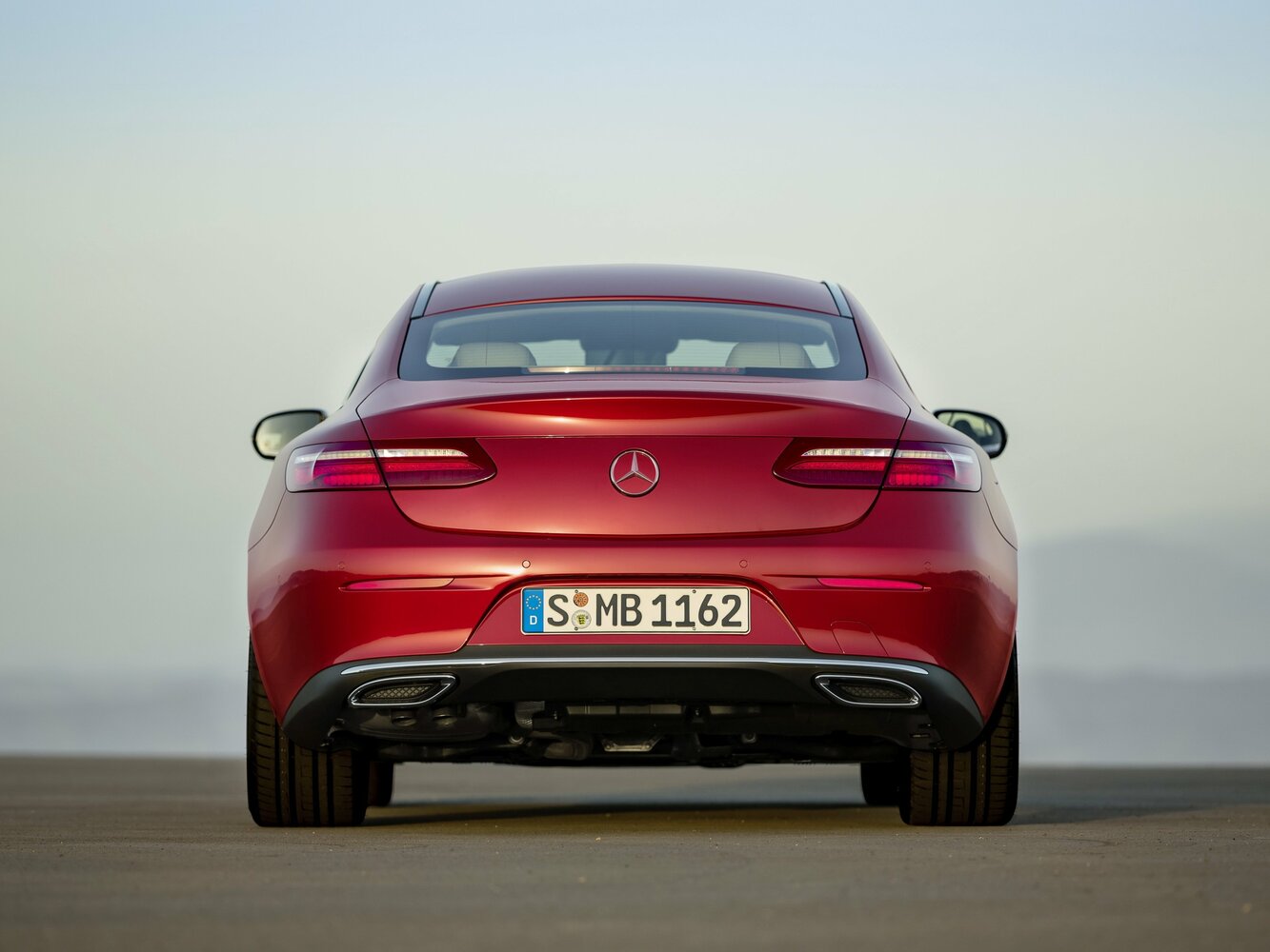 Сзади
